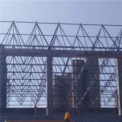 网架高空散装法是指小拼单元或散件在设计位置进行总拼的方法